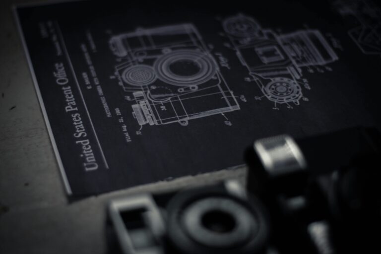 Detailed blueprint of a camera with an official patent from the United States Patent Office.